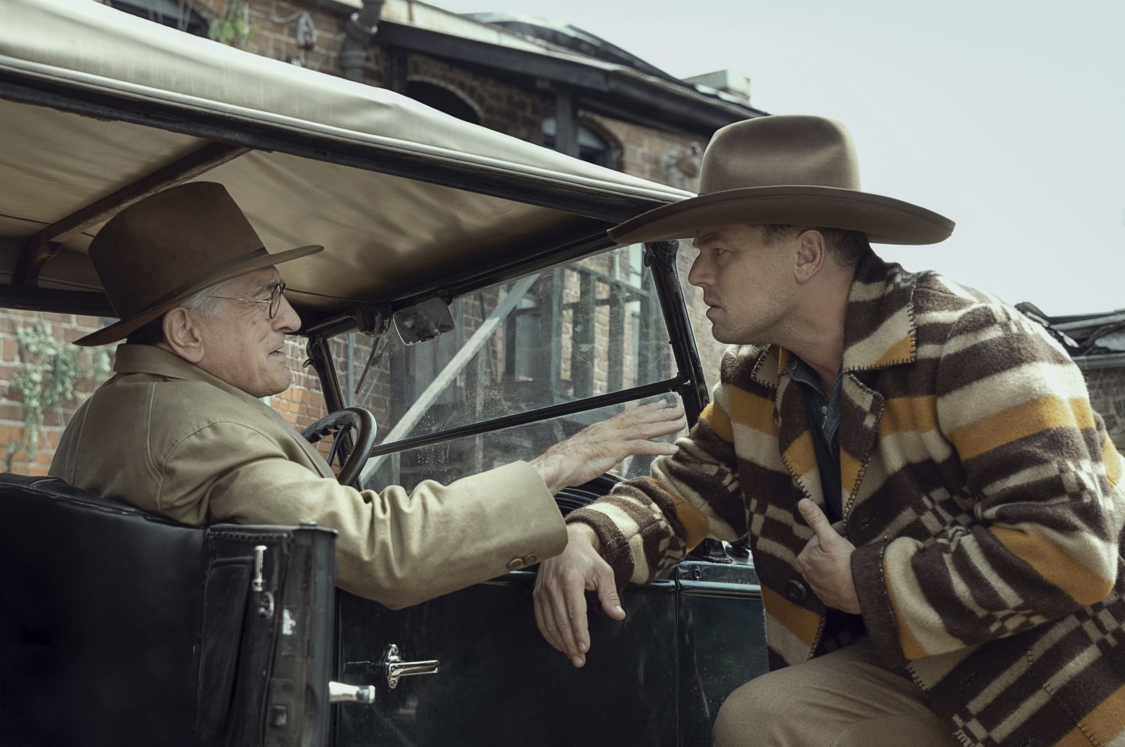 This image released by Apple TV  shows Robert De Niro (L) and Leonardo DiCaprio in a scene from "Killers of the Flower Moon." (AP Photo)