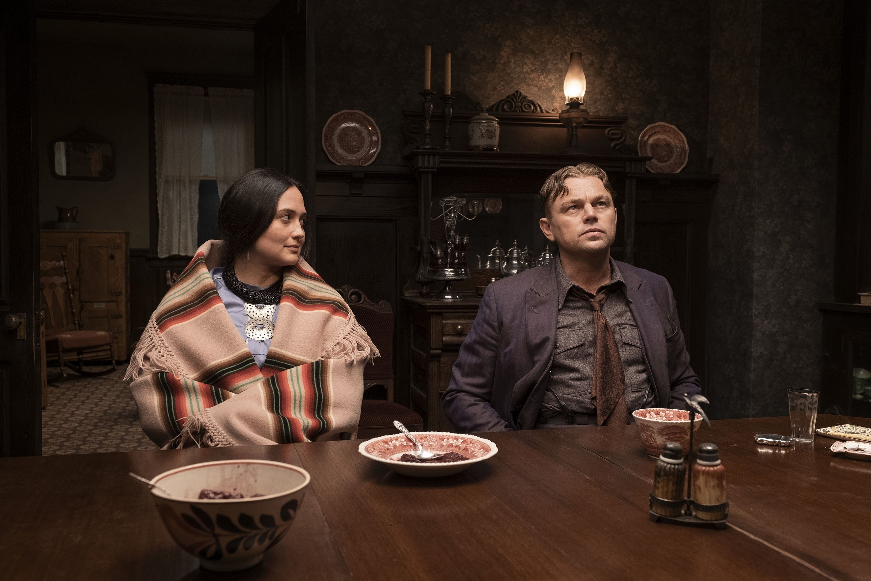 298875 This image released by Apple TV shows Lily Gladstone (L) and Leonardo DiCaprio in a scene from