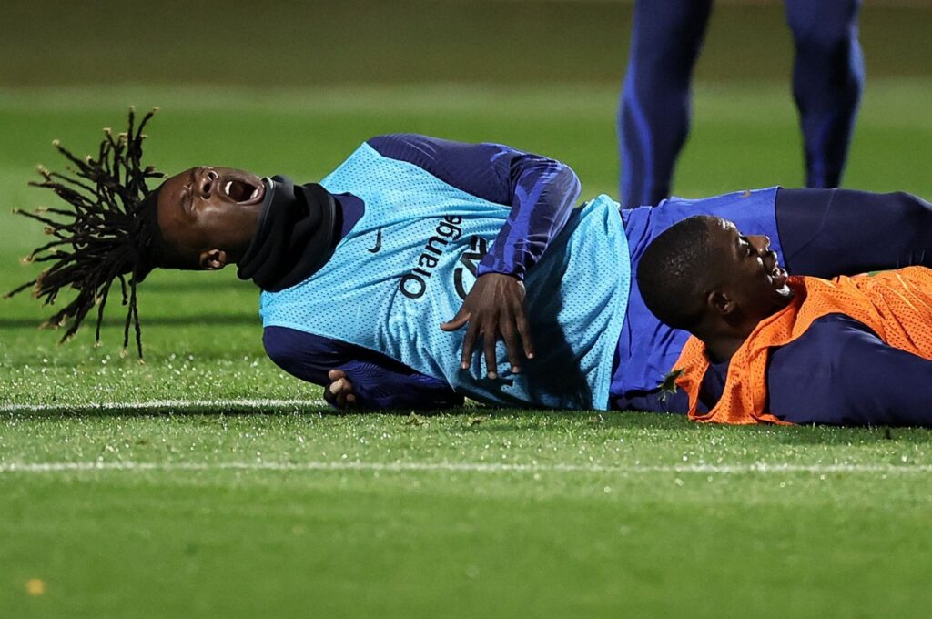 France's midfielder Eduardo Camavinga (L) reacts after a tackle by France's forward Ousmane Dembele during a training session, Clairefontaine-en-Yvelines, France, Nov. 15, 2023. (AFP Photo)