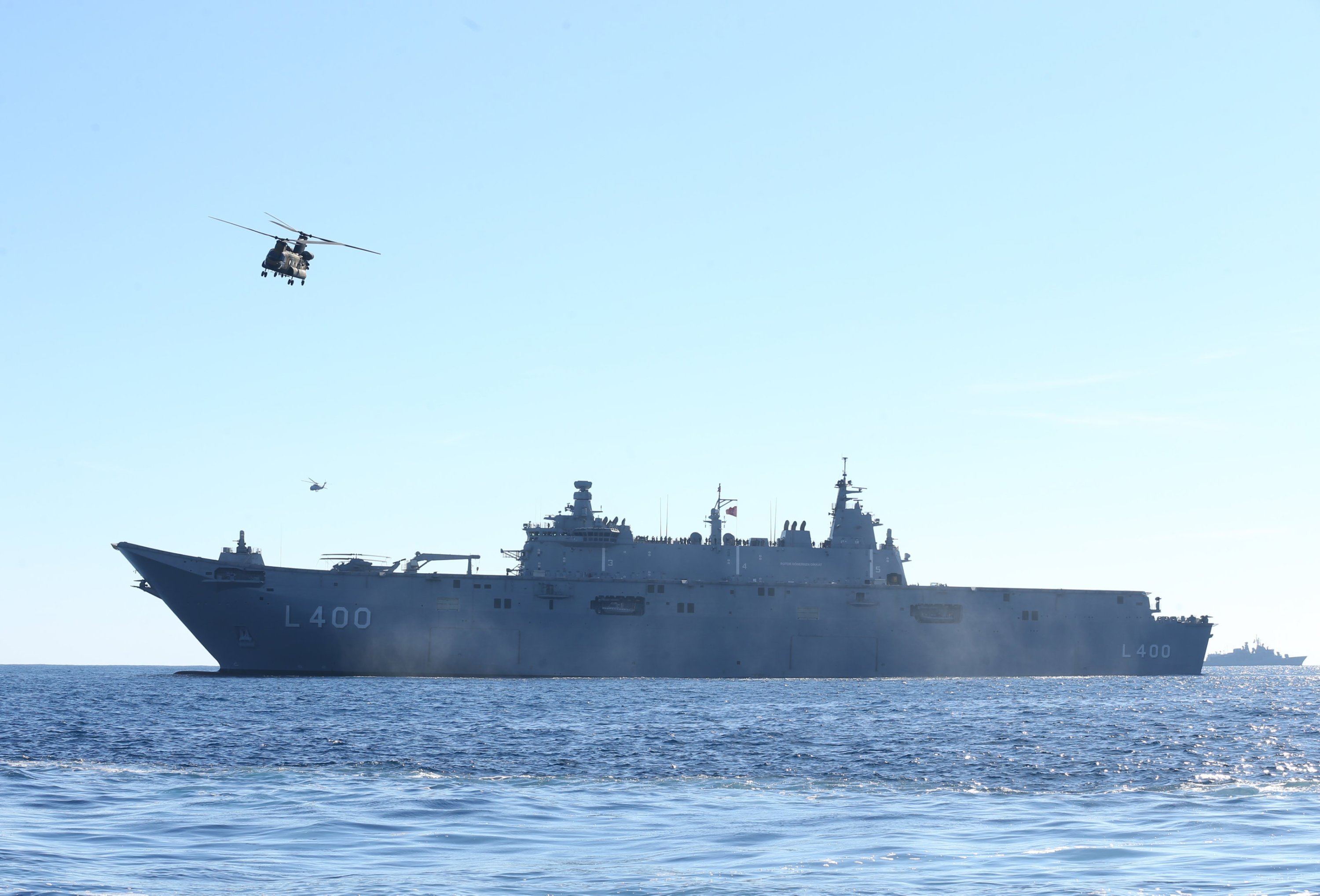 302500 A helicopter flies over the TCG Anadolu as it oversees the Eastern Mediterranean-2023 Exercise off the coast of southern Antalya province, Türkiye, Nov. 23, 2023. (AA Photo)