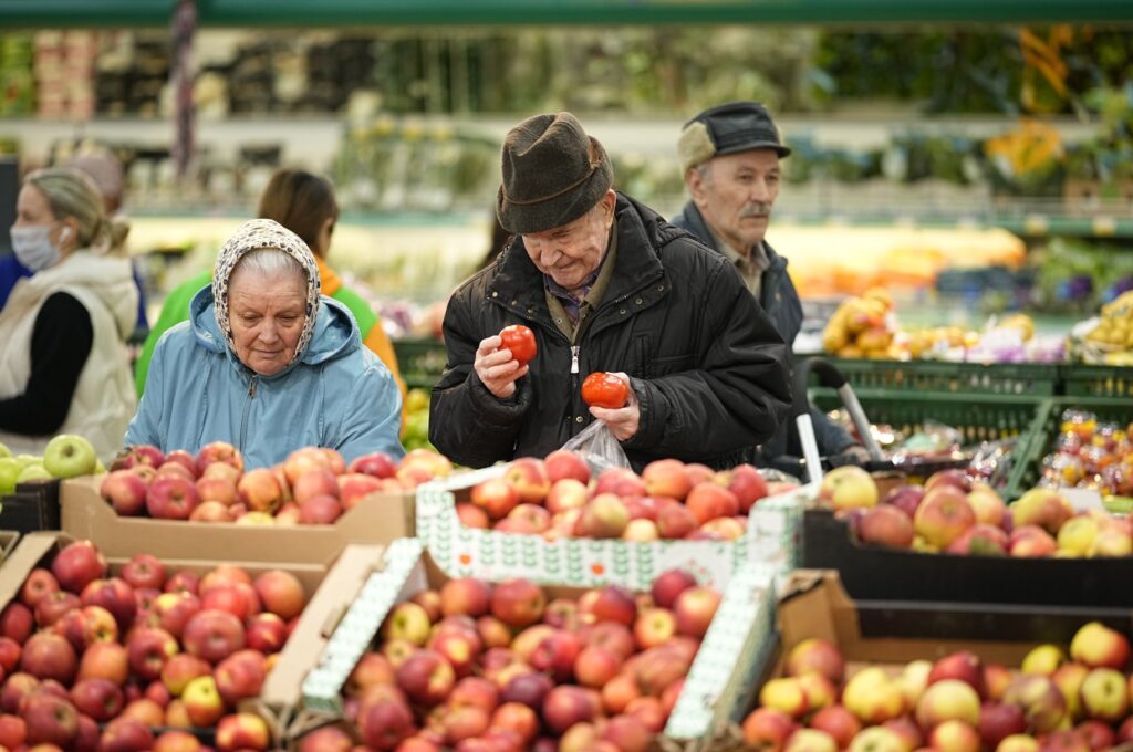 People buy fruit at a supermarket, Moscow, Russia, Nov. 3, 2023. (AP Photo)