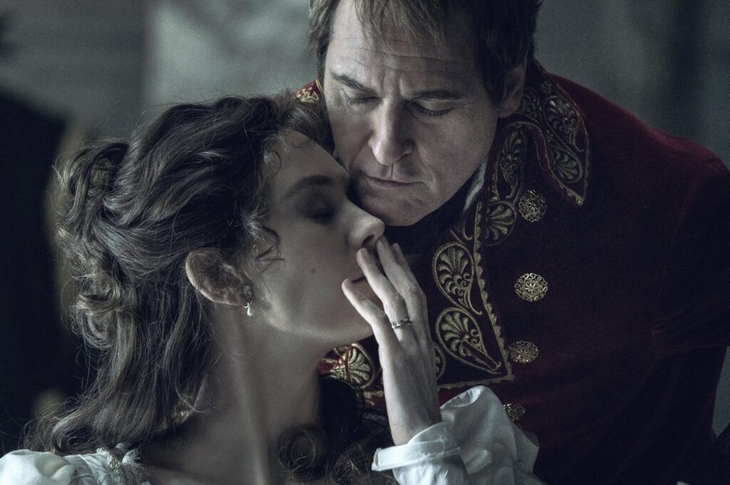 This image released by Apple TV  shows Vanessa Kirby, left, and Joaquin Phoenix in a scene from "Napoleon." (AP Photo)