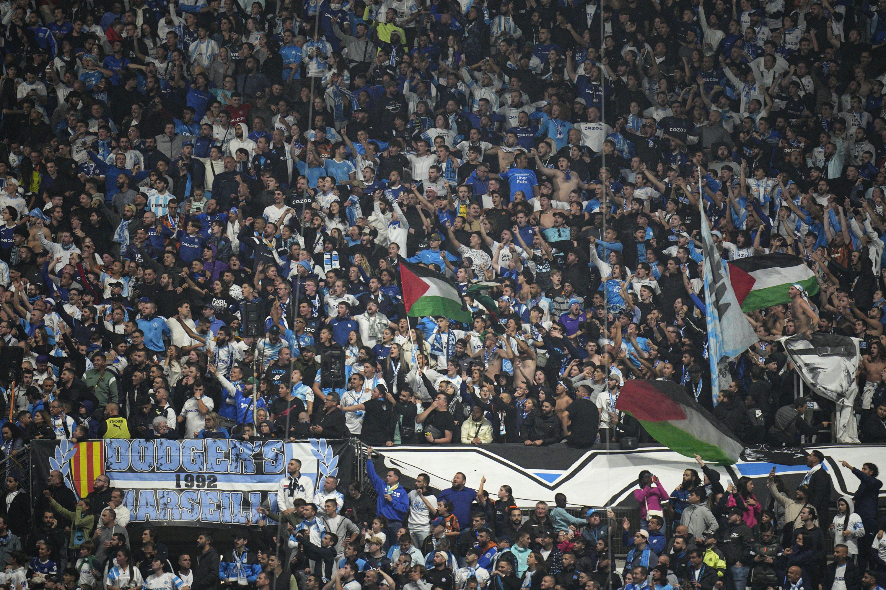 303533 Marseille fans wait for the start of the French Ligue 1 match against Lyon at the Velodrome Stadium, Marseille, France, Oct. 29, 2023. (AP Photo)