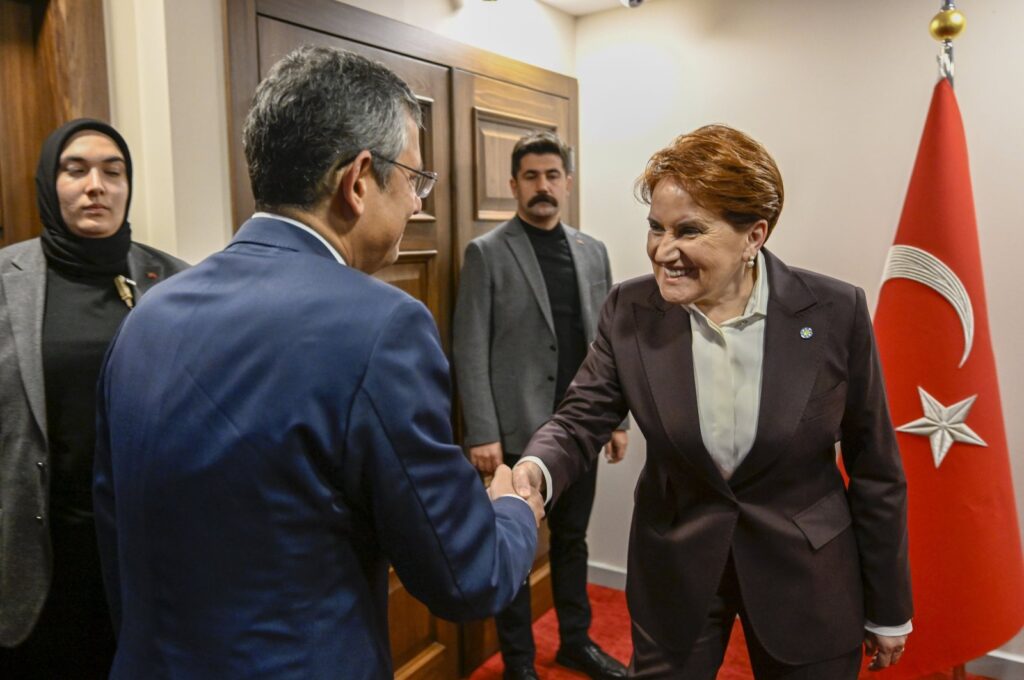 CHP leader Özgür Özel (L) shakes hands with Meral Akşener, in the capital Ankara, Türkiye, Nov. 30, 2023. (AA Photo)