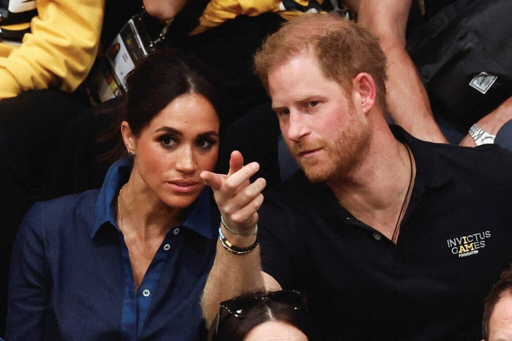 Britain's Prince Harry, Duke of Sussex and his wife Meghan, Duchess of Sussex, attend a volleyball game, Duesseldorf, Germany, Sept. 15, 2023. (Reuters Photo)
