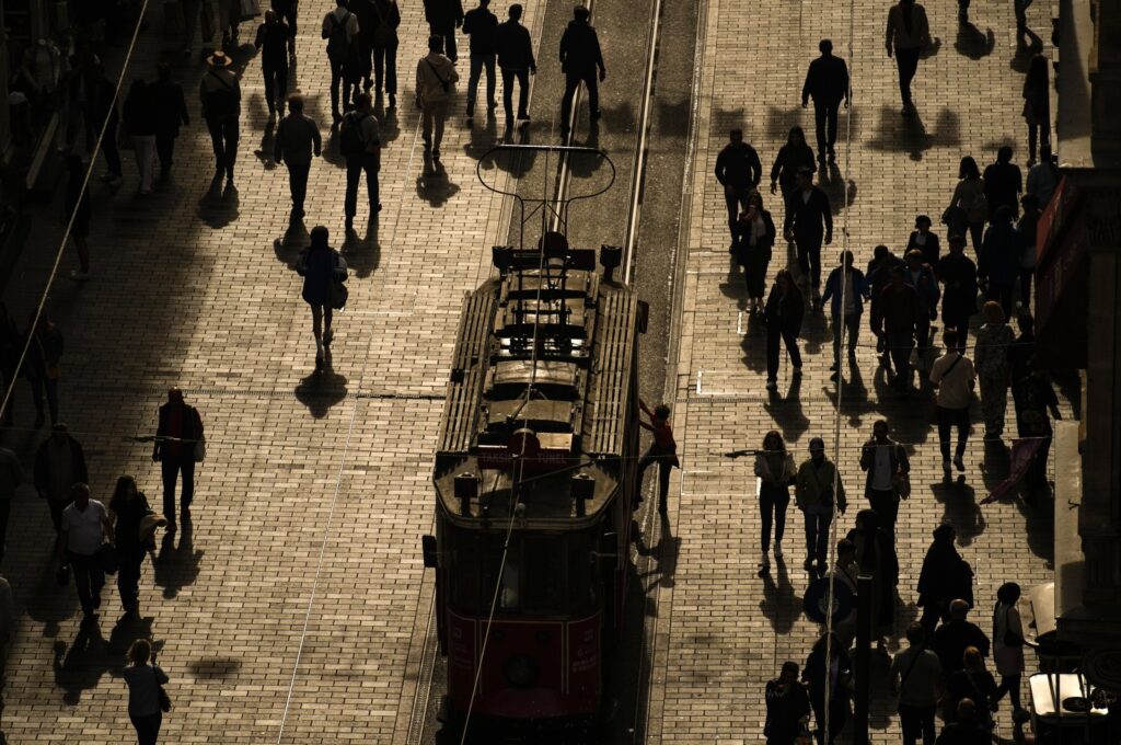 People walk on famed Istiklal Avenue, in Istanbul, Türkiye, Oct. 25, 2023. (AP Photo)