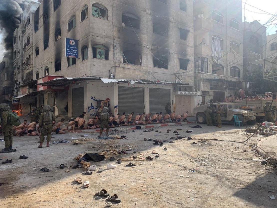 304588 Footage images from Gaza shows Israeli troops detaining dozens of Palestinian men. (Emanuel (Mannie) Fabian on X)