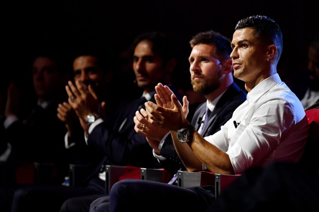 Cristiano Ronaldo and Lionel Messi react during the UEFA Champions League Draw in Monaco, Aug. 29, 2019. (Getty Images)