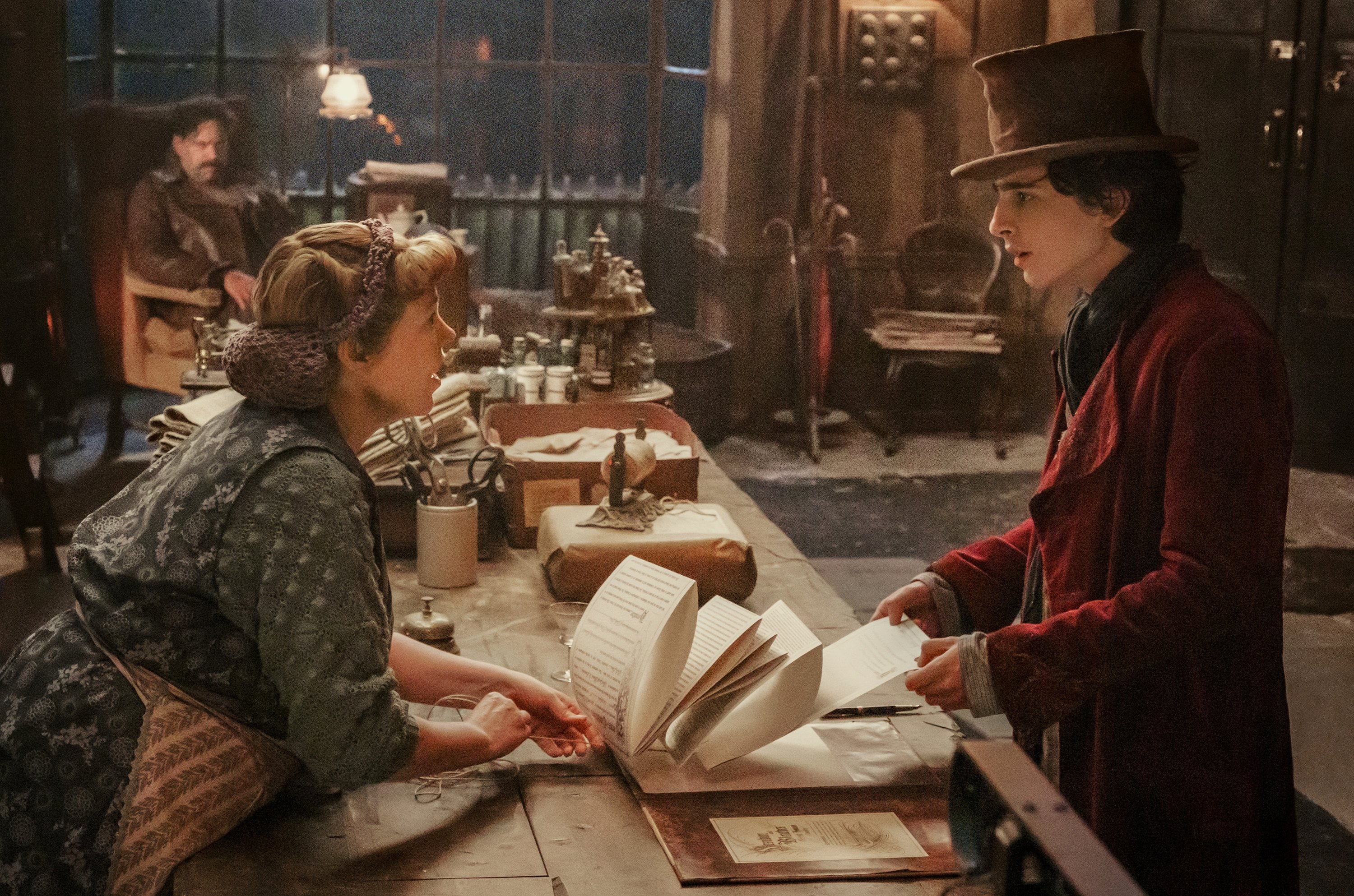 305571 This image released by Warner Bros. Pictures shows Olivia Colman (L) and Timothee Chalamet in a scene from