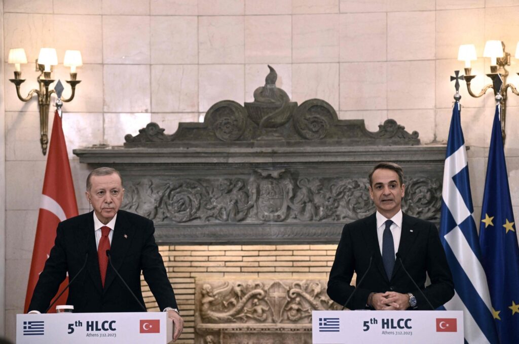 President Recep Tayyip Erdoğan (L) and Greek Prime Minister Kyriakos Mitsotakis speak to the press after their meeting during Erdoğan's official visit to Greece, Athens, Dec. 7, 2023. (AFP Photo)