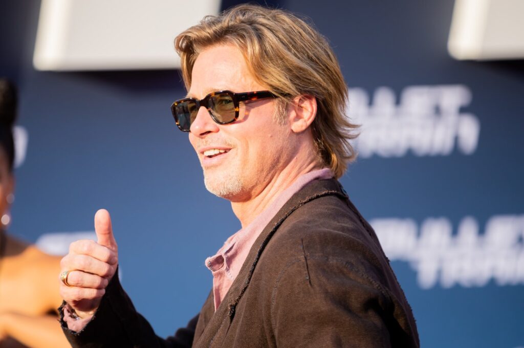 Brad Pitt gives a thumbs up as he arrives at the German premiere of the feature film "Bullet Train" at the Zoopalast, Berlin, Germany, July 19, 2022. (Getty Images Photo)