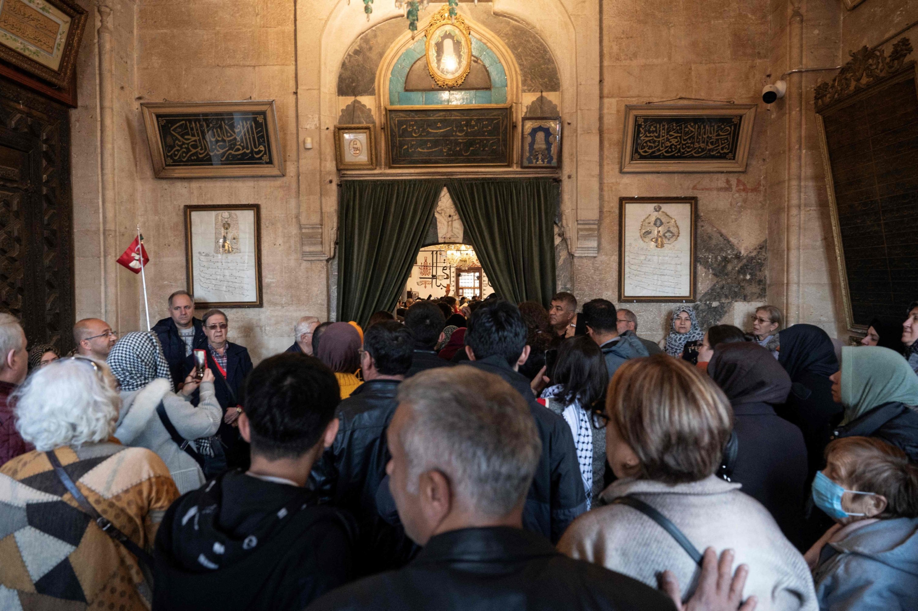 306255 People visit the Mevlana Museum, the place of Mevlana Jalaluddin Rumi's tomb in Konya, Türkiye, Dec. 16, 2023. (AFP Photo)