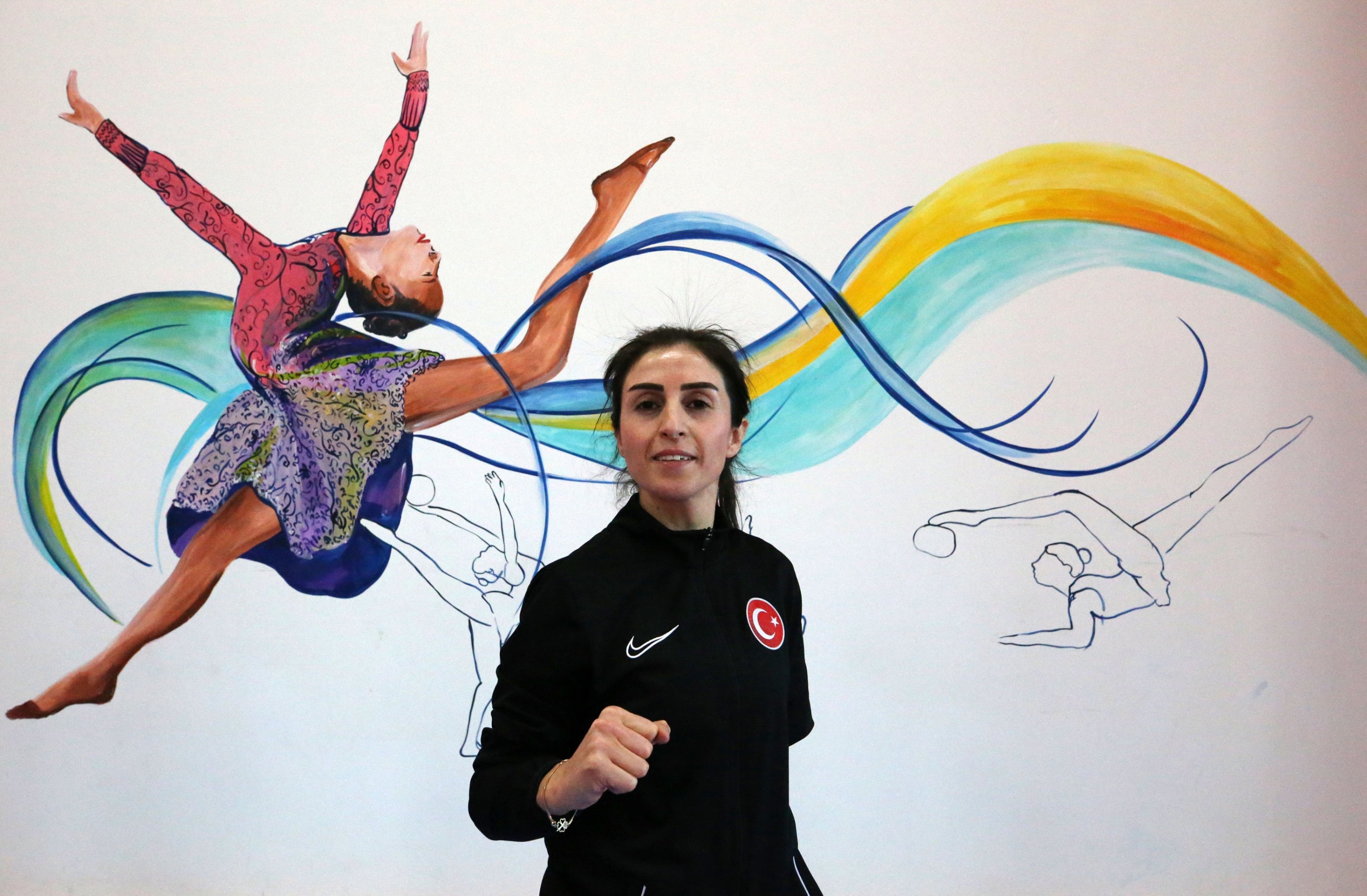 306315 Turkish Taekwondo star Nurcihan Ekinci (L) poses for a photo after training for the Paris Olympics, Bitlis, Türkiye, Dec. 18, 2023. (AA Photo)