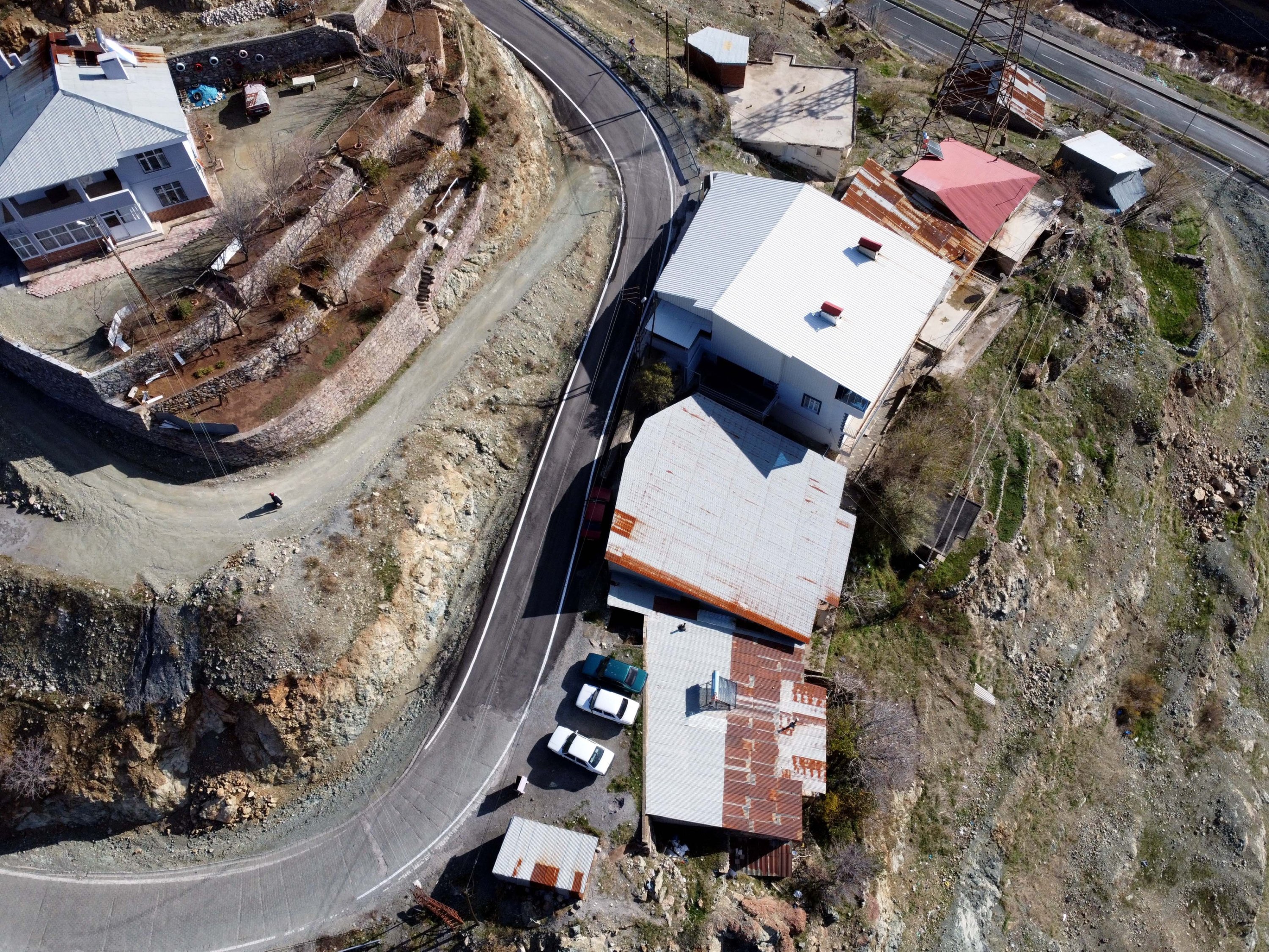 306448 An aerial view of the Çağıran brothers' apartment terrace classic car garage, Maden, Elazığ, Türkiye, Dec. 16, 2023. (AA Photo)