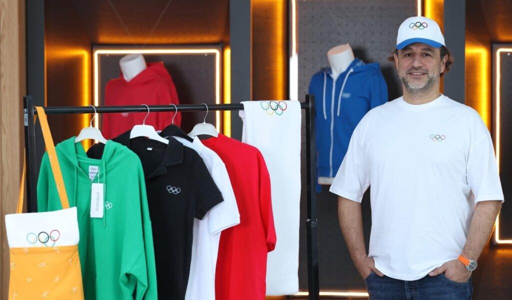 Trendyol Group President Çağlayan Çetin is photographed along the collection of Olympics collection apparel. (Courtesy of Trendyol)