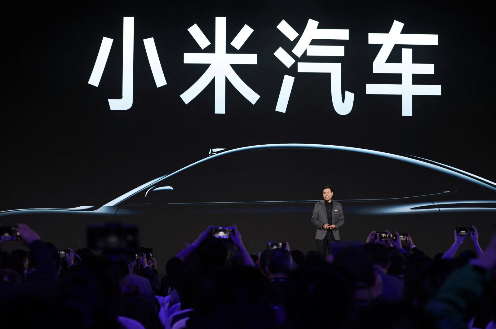 Xiaomi founder and CEO Lei Jun speaks at an event on the company's first electric vehicle (EV) SU7, in Beijing, China, Dec. 28, 2023. (Reuters Photo)