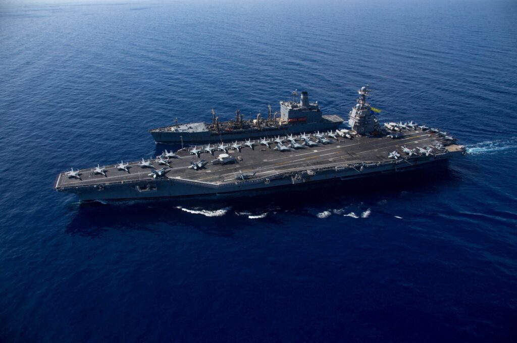 USS Gerald R. Ford cruises alongside the USNS Laramie (T-AO-203) during a fueling-at-sea in the Eastern Mediterranean, Oct. 14, 2023. (U.S Naval Forces Central Command / U.S. 6th Fleet / Handout via Reuters)