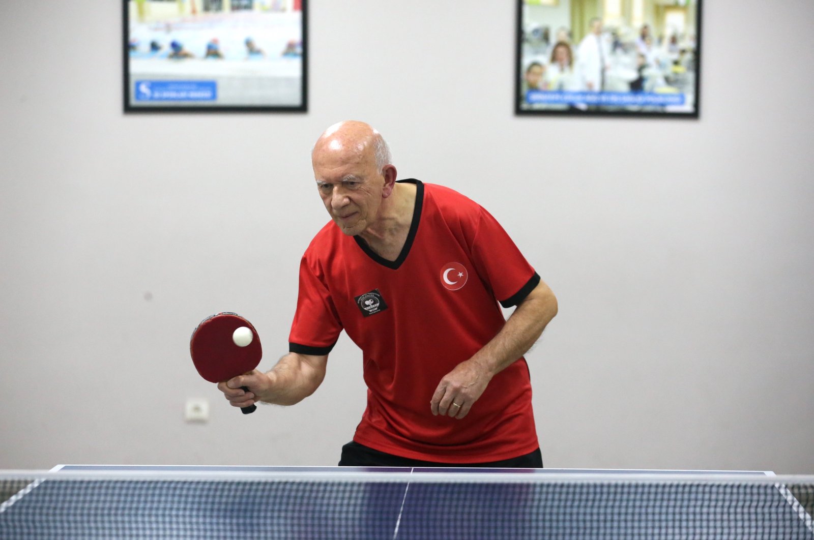 Veteran table tennis player Şenel Altun trains at the Eskişehir Veterans Table Tennis Sports Club, Eskişehir, Türkiye, Jan. 4, 2024. (AA Photo)