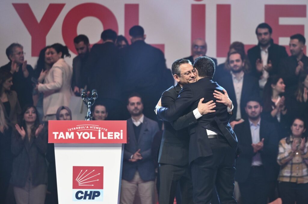 Republican People's Party (CHP) Chair Özgür Özel (L) embraces Istanbul Mayor Ekrem Imamoğlu after he announces his rerun for upcoming local elections during a rally in Istanbul, Türkiye, Jan. 5, 2024. (AA Photo)