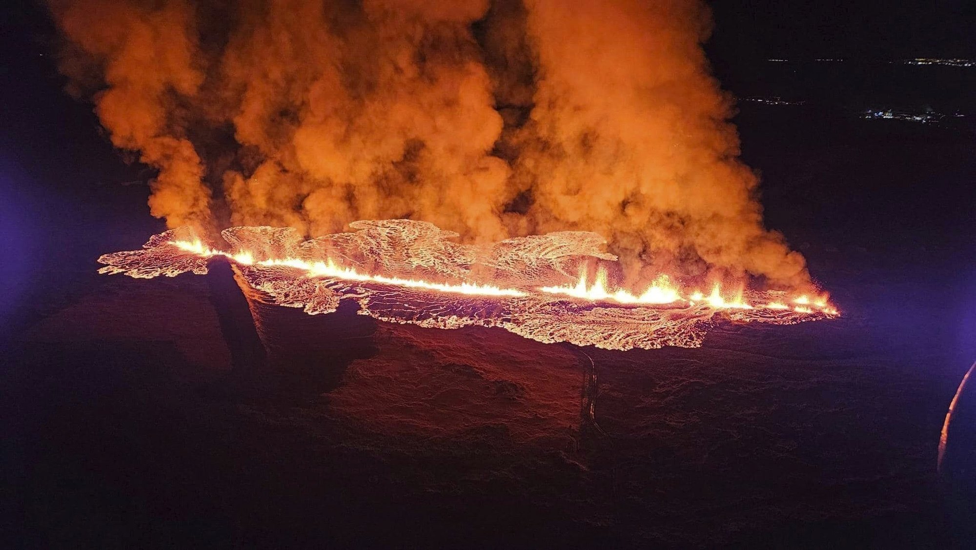 310177 Lava flows toward residential buildings after a volcanic eruption, Grindavik, Iceland, Jan. 14. 2024. (AP Photo)