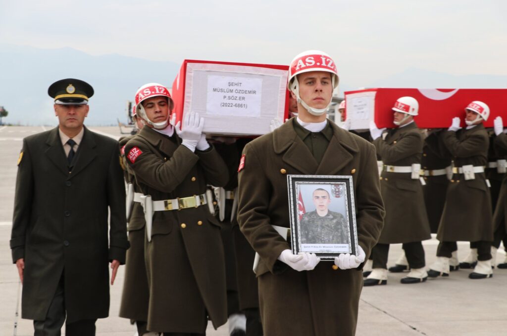 Turkish soldiers carry the coffins of two soldiers killed in clashes with the PKK in northern Iraq as they bring the bodies to Kahramanmaraş province, Türkiye, Jan. 13, 2024. (AA Photo)