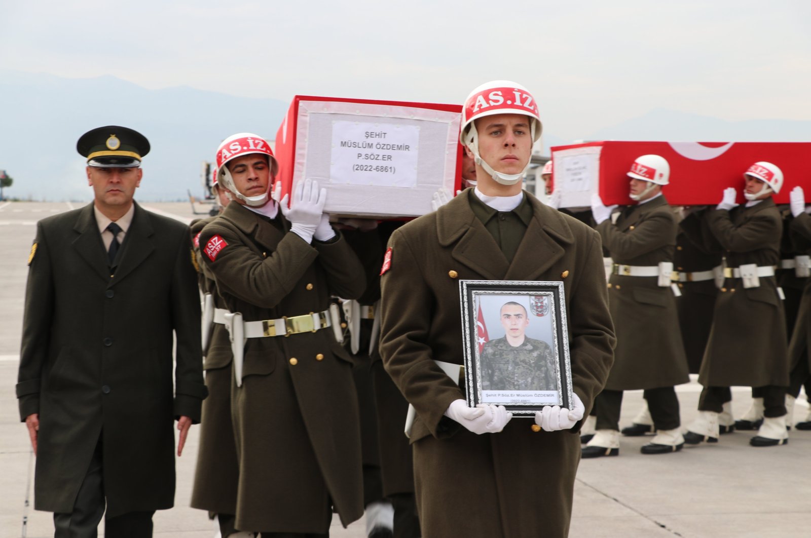 Turkish soldiers carry the coffins of two soldiers killed in clashes with the PKK in northern Iraq as they bring the bodies to Kahramanmaraş province, Türkiye, Jan. 13, 2024. (AA Photo)
