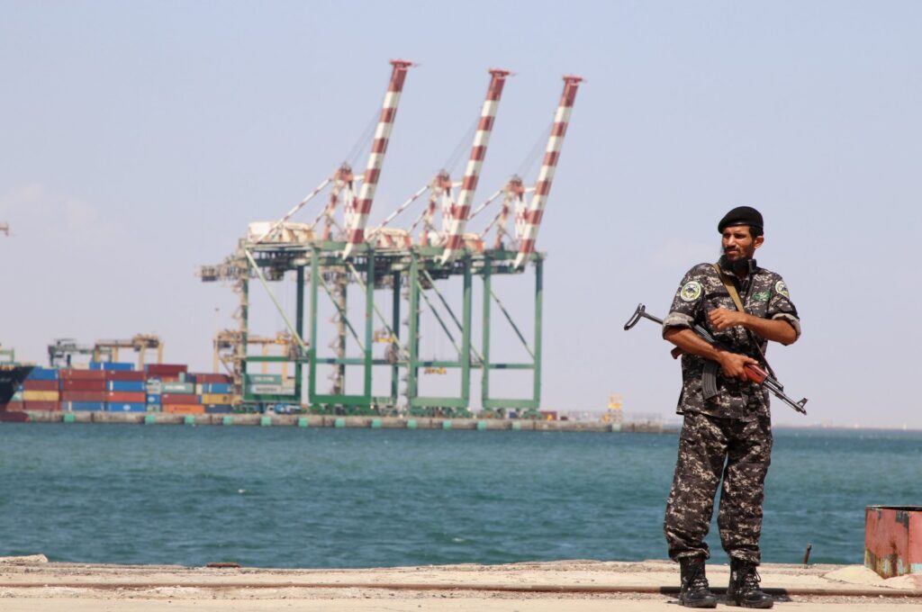 A police trooper stands guard near the Aden port in Aden, Yemen Nov. 16, 2019. (Reuters File Photo)