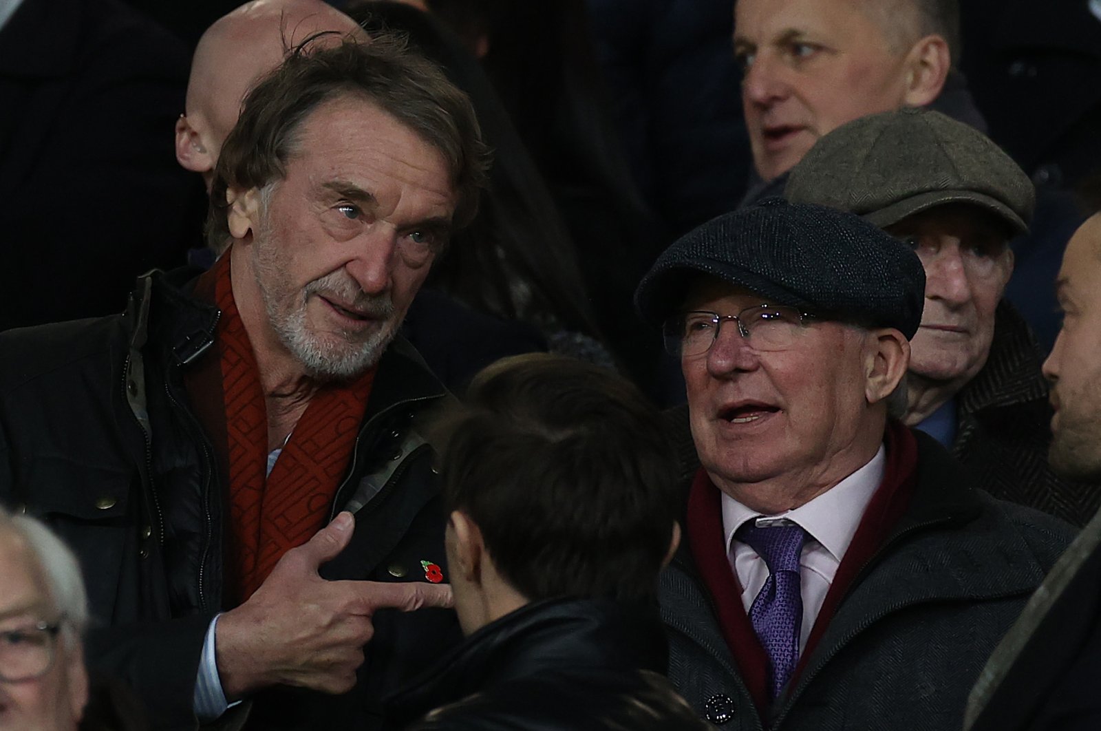 Sir Jim Ratcliffe (L) talks to Sir Alex Ferguson in the directors' box ahead of the Premier League match between Manchester United and Tottenham Hotspur at Old Trafford, Manchester, U.K., Jan. 14, 2024. (Getty Images Photo)