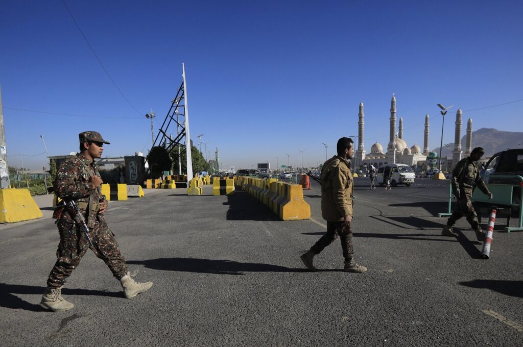 Houthi troopers patrol at a shrine of slain Houthi fighters, in Sana'a, Yemen, Jan. 17, 2024. (EPA Photo)