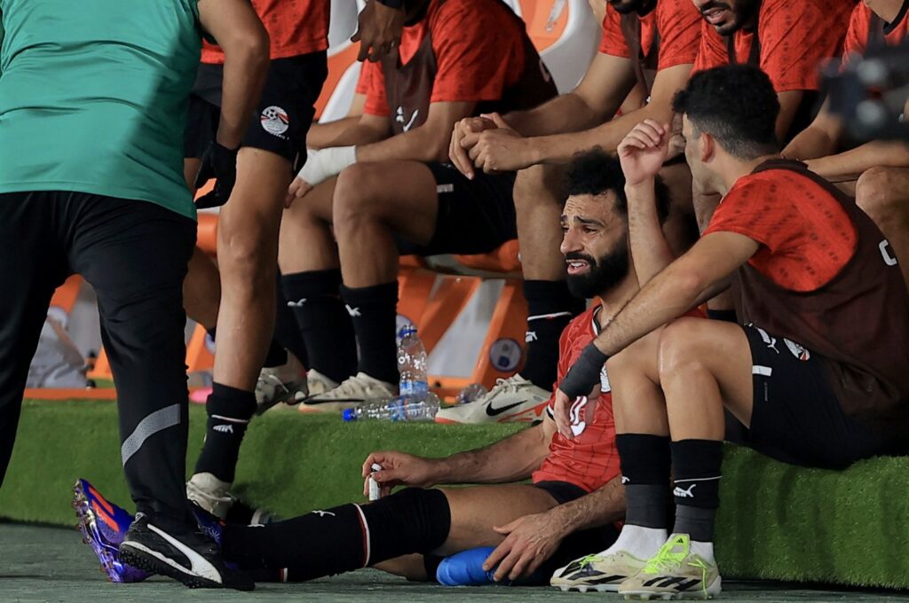 Egypt's Mohamed Salah cries after being injured during the AFCON match against Ghana, Abidjan, Ivory Coast, Jan. 18, 2024. (AA Photo)
