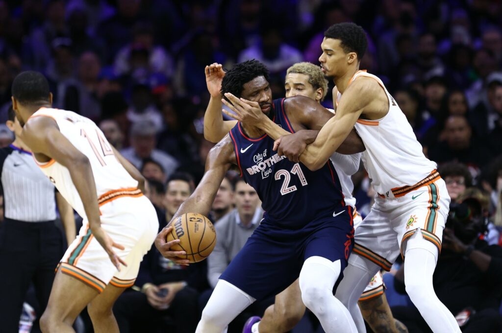 Philadelphia 76ers' Joel Embiid (C) is guarded by San Antonio Spurs players during the second quarter at the Wells Fargo Center, Philadelphia, U.S., Jan. 22, 2024. (Getty Images Photo)