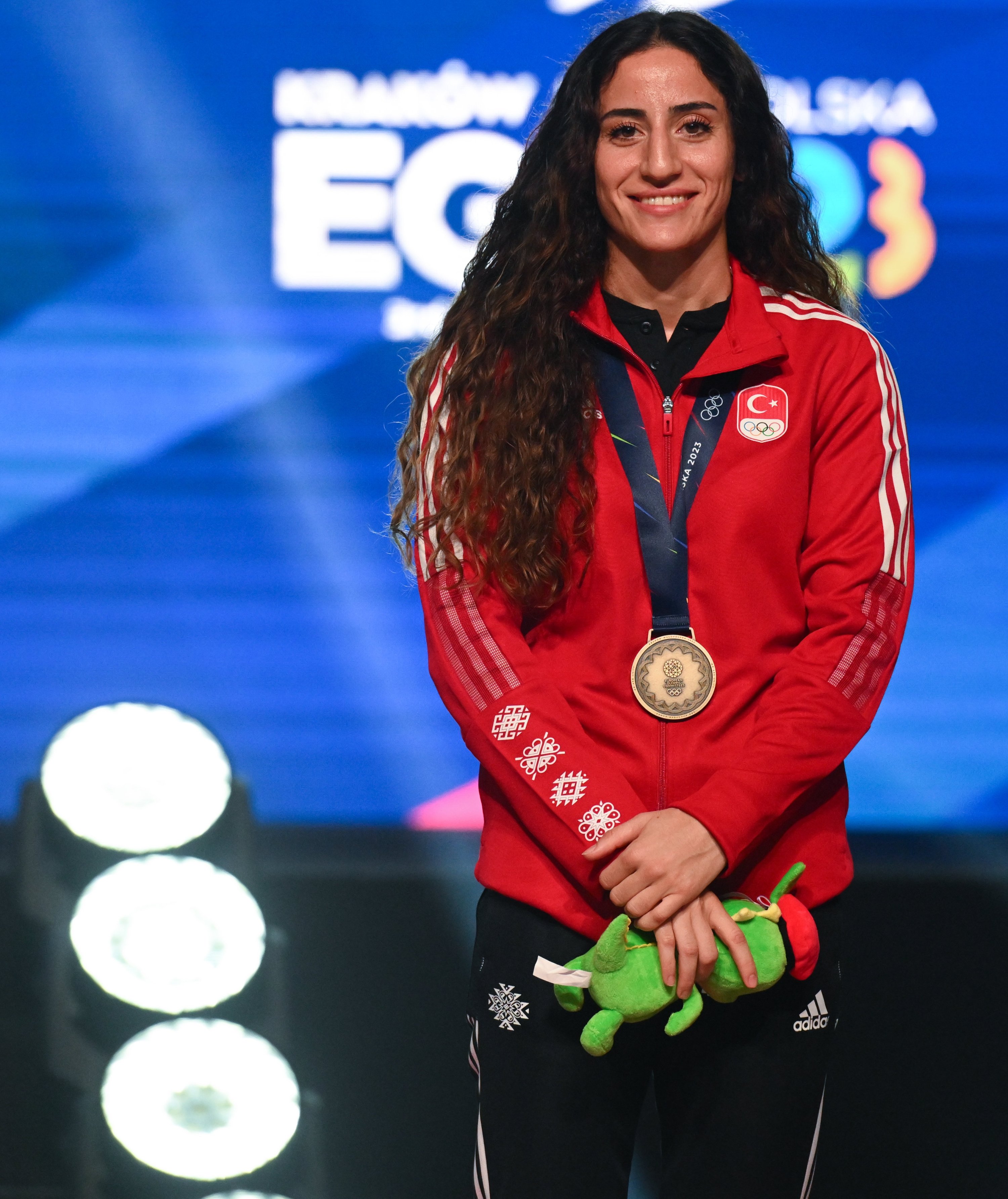 311668 Gizem Özer poses for a photo at the podium after winning the gold medal at the 3rd European Games, Warsaw, Poland, July 3, 2023. (AA Photo)