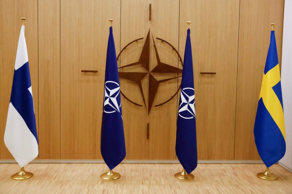 A view of the flags of Finland, NATO and Sweden during a ceremony to mark Sweden's and Finland's application for membership in Brussels, Belgium, May 18, 2022. (Reuters File Photo)