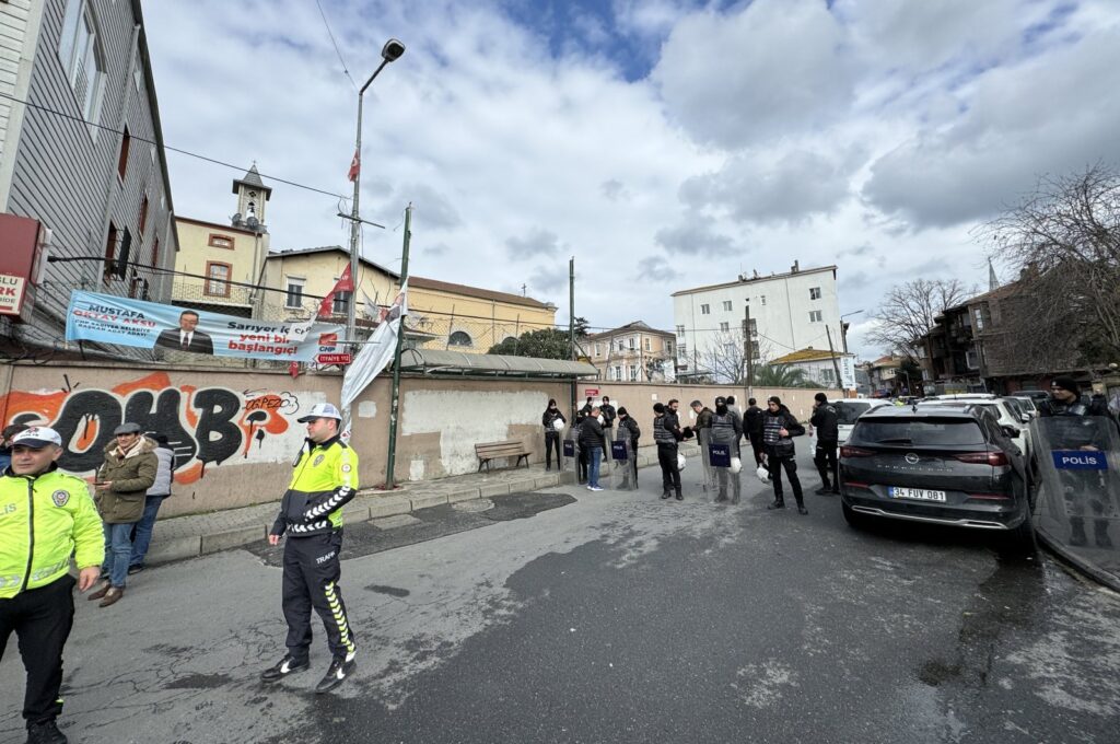 Police officers patrol the area after the attack on Santa Maria Church, Istanbul, Türkiye, Jan 28, 2024. (AA Photo)