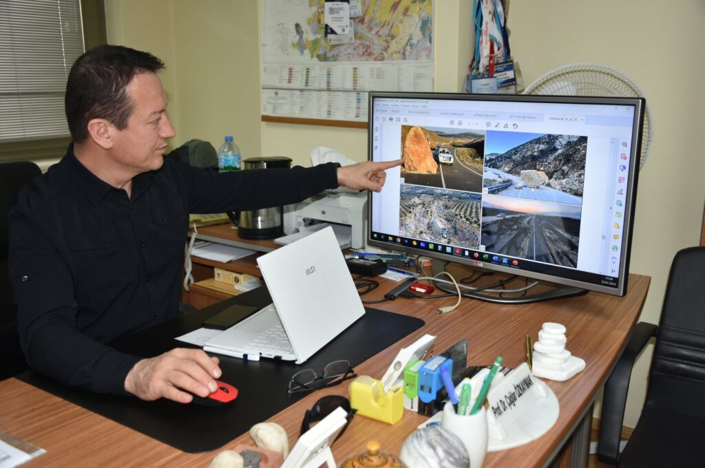 Çağlar Özkaymak, director of Afyon Kocatepe University's Earthquake Application and Research Center, explains fault lines, Hatay, Türkiye, Feb. 4, 2024. (AA Photo)