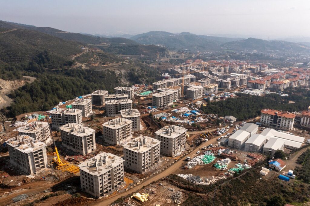 An aerial view shows new residential buildings being constructed after last year's devastating earthquake in Hatay province, southern Türkiye, Feb. 2, 2024. (Reuters Photo)