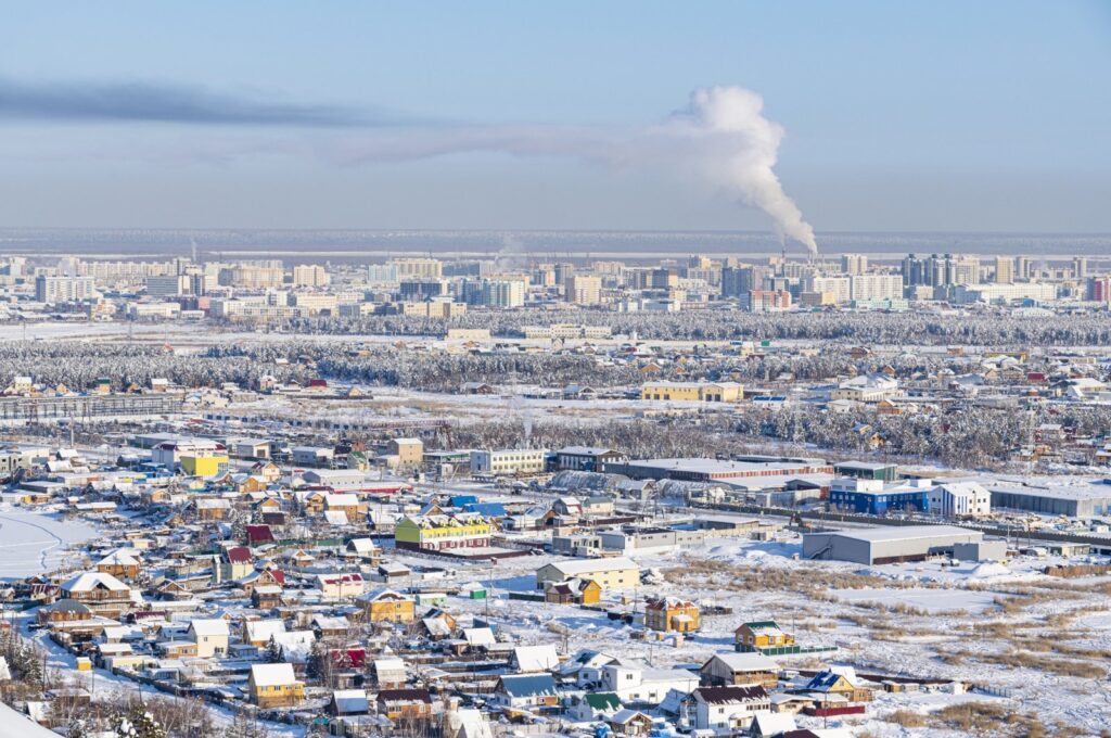 In Russia's Far East, laborers endure bitter cold and extreme conditions to maintain hulking vessels encased in ice during the grueling "vymorozka" process. (Getty Images Photo)
