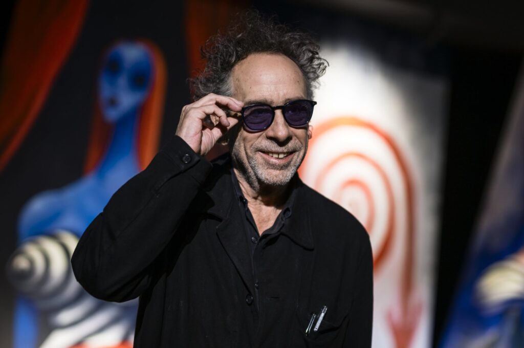 The American filmmaker Tim Burton smiles during a press conference for "The World of Tim Burton" exhibition opening, Turin, Italy, Oct. 10, 2023. (Getty Images Photo)
