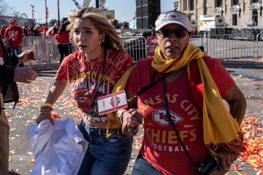 People flee after shots were fired near the Kansas City Chiefs' Super Bowl LVIII victory parade, Kansas City, Missouri, U.S., Feb. 14, 2024. (AFP Photo)
