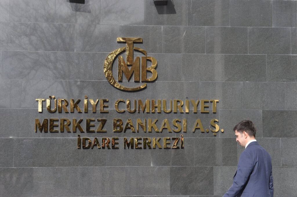 A man walks in front of the headquarters of the Central Bank of the Republic of Türkiye (CBRT), Ankara, Türkiye, Feb. 8, 2024. (EPA Photo)