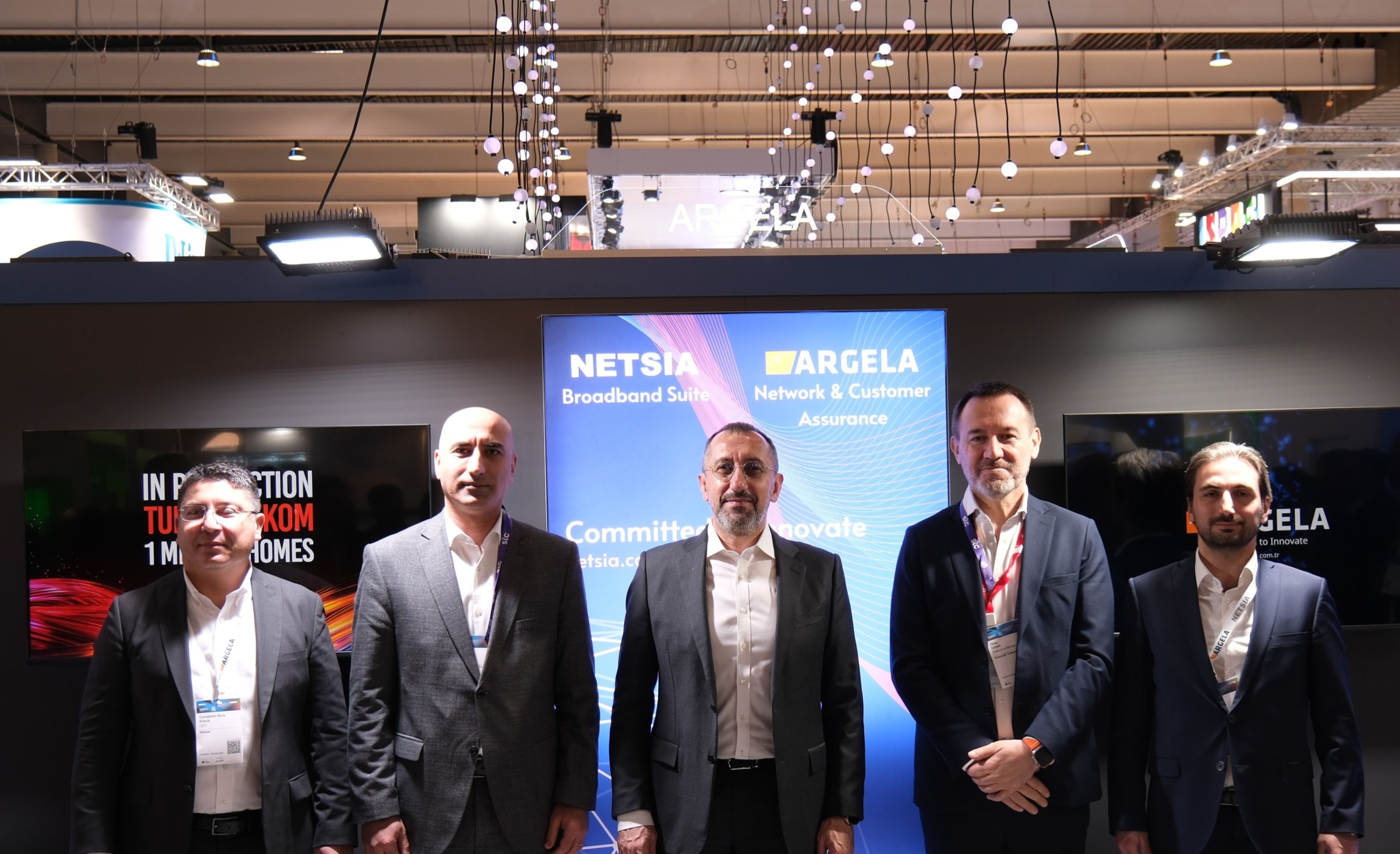 317065 Türk Telekom CEO Umit Önal poses for a photo with Azercell officials after signing a collaboration agreement, Barcelona, Spain, Feb. 26, 2024. (AA Photo)