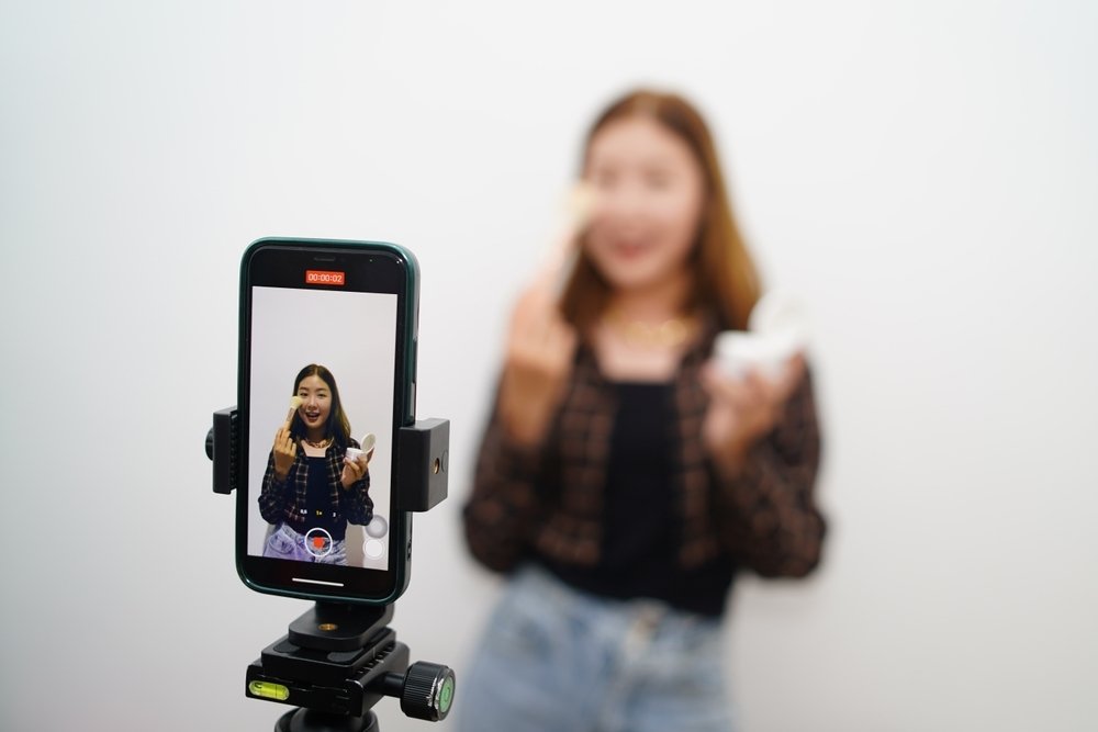 American girls aged 8 to 12 gain thousands of followers on TikTok by showcasing their makeup purchases. (Shutterstock Photo)