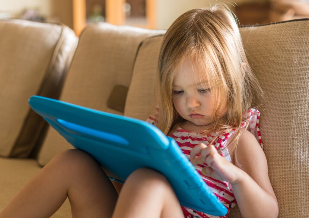 Australian researchers caution that young children's screen time can hinder language development by limiting interactions and conversations. (Shutterstock Photo)