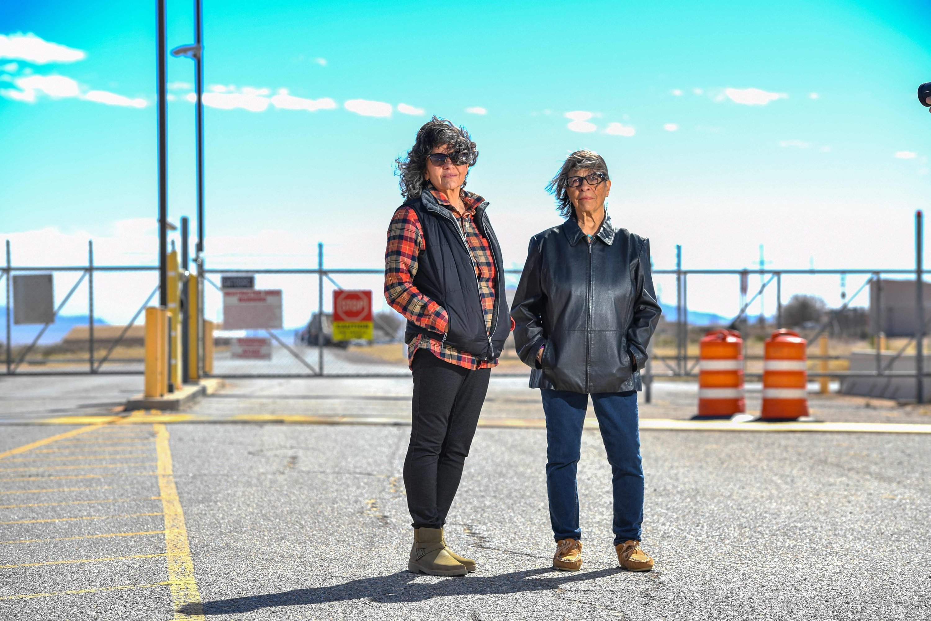 318272 Tina Cordova (L) and Louisa Lopez pose for a photo in front of the entrance of White Sands Missile Range where the Trinity test site is located, near White Sands, New Mexico, U.S., Feb. 21, 2024. (AFP Photo)
