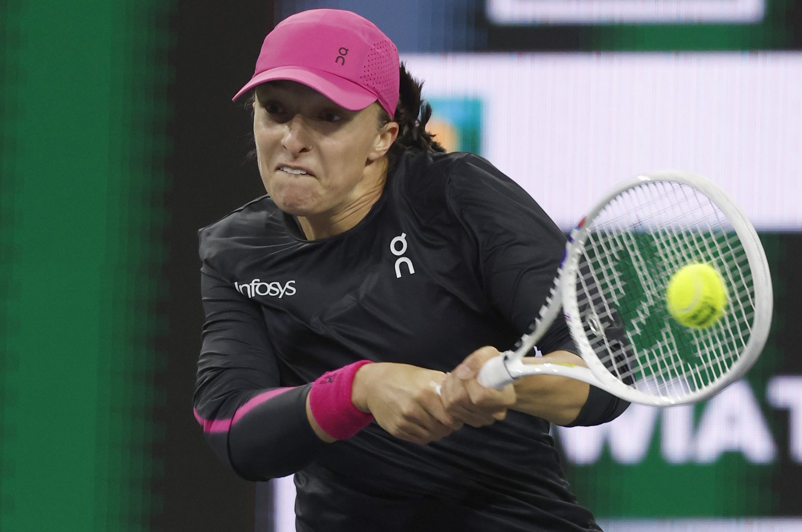 Poland's Iga Swiatek in action against Kazakhstan's Yulia Putintseva during the BNP Paribas Open, Indian Wells, U.S., March 12, 2024. (EPA Photo)