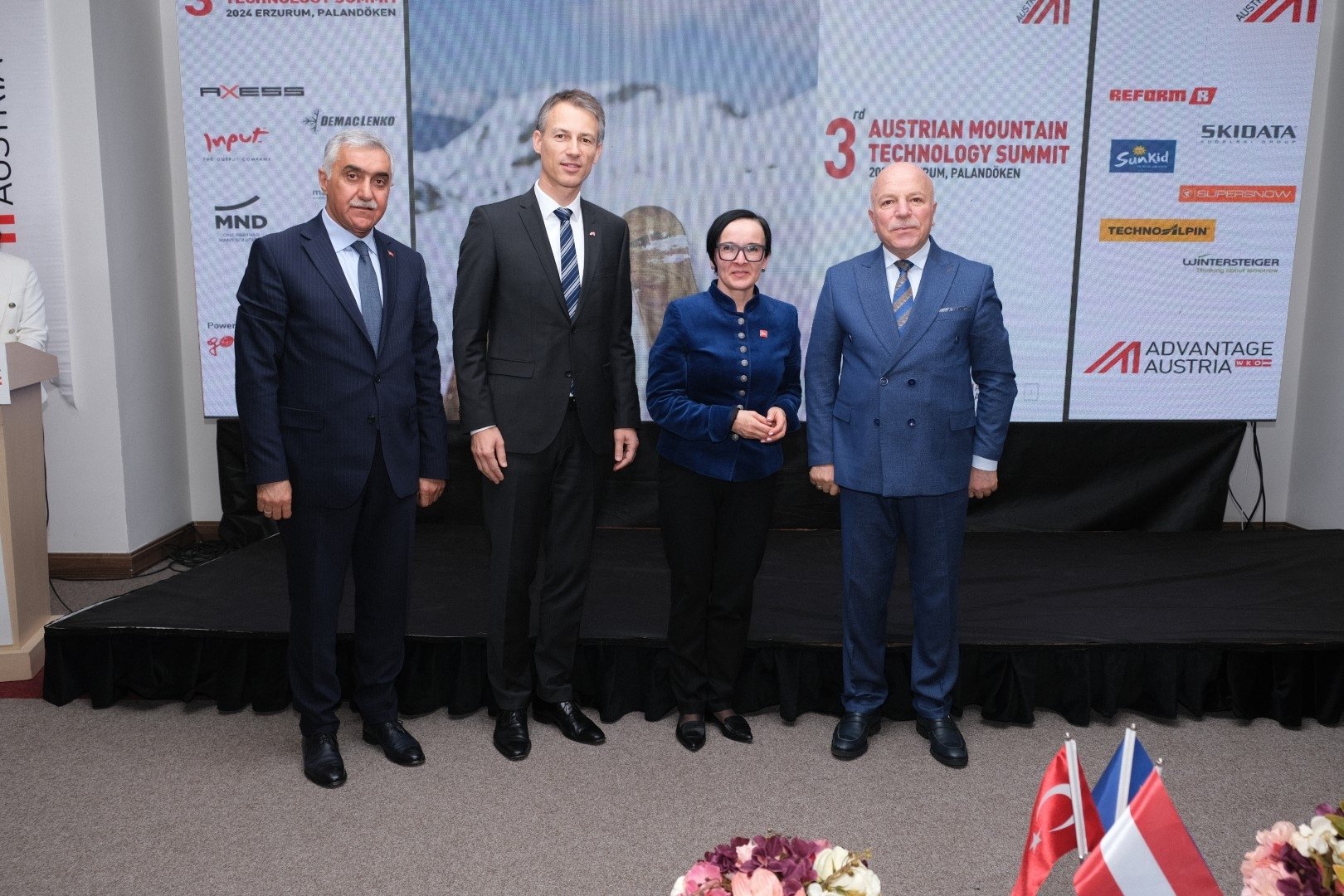 319446 From left, Zafer Aynalı, secretary-general of the Erzurum Metropolitan Municipality, Gerhard Lackner, Austria's trade commissioner for Türkiye, Azerbaijan and Georgia, Austria's Ambassador to Ankara Gabriele Juen, and Erzurum Mayor Mehmet Sekmen pose for a photo during the Austrian Mountain Technology Summit at Palandöken, in Erzurum, eastern Türkiye, March 8, 2024. (Courtesy of Advantage Austria)