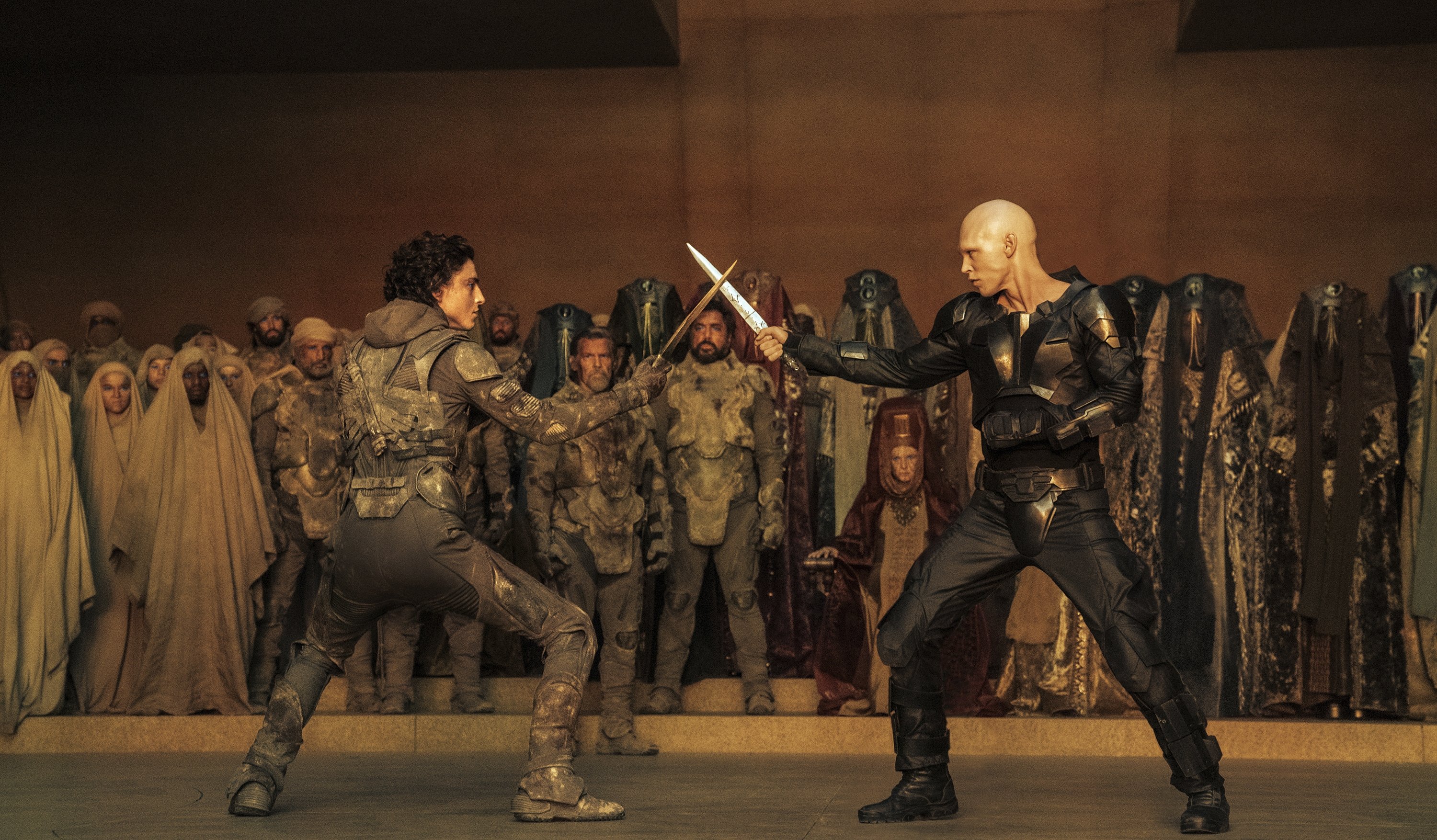 319482 This image released by Warner Bros. Pictures shows Timothee Chalamet, foreground left, and Austin Butler in a scene from 'Dune: Part Two.' (AP Photo)