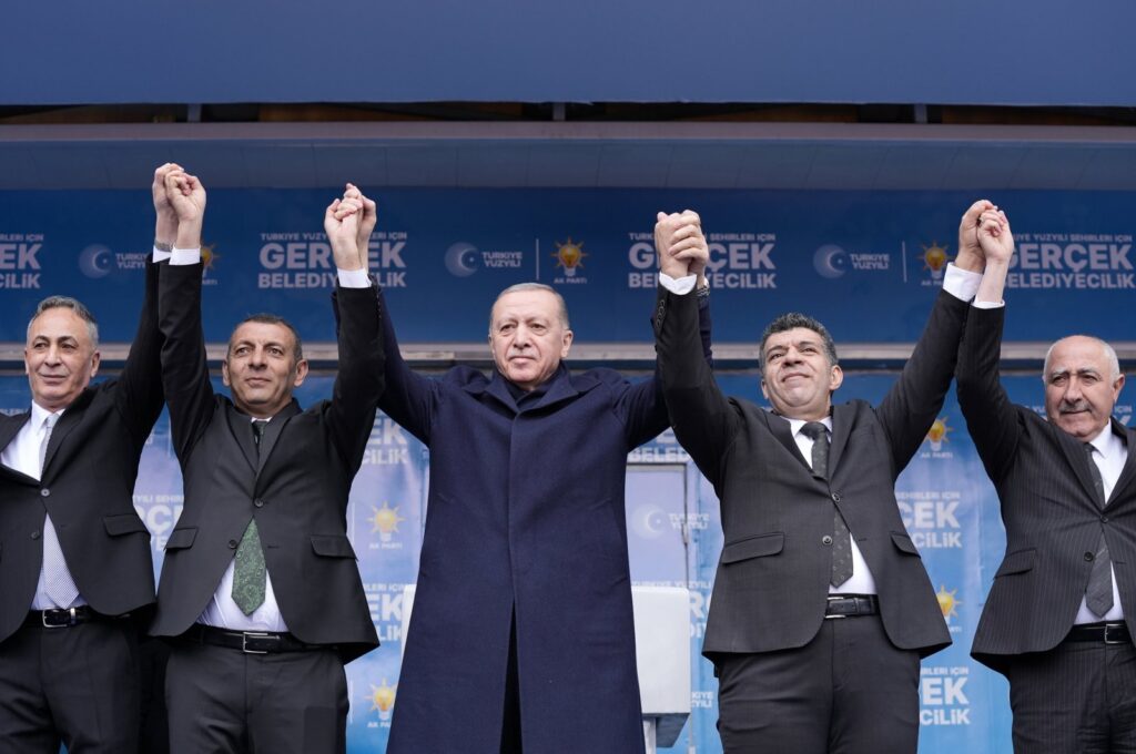 President Recep Tayyip Erdoğan (C) greets supporters with Justice and Development Party (AK Party) candidates in Ağrı, eastern Türkiye, March 14, 2024. (AA Photo)