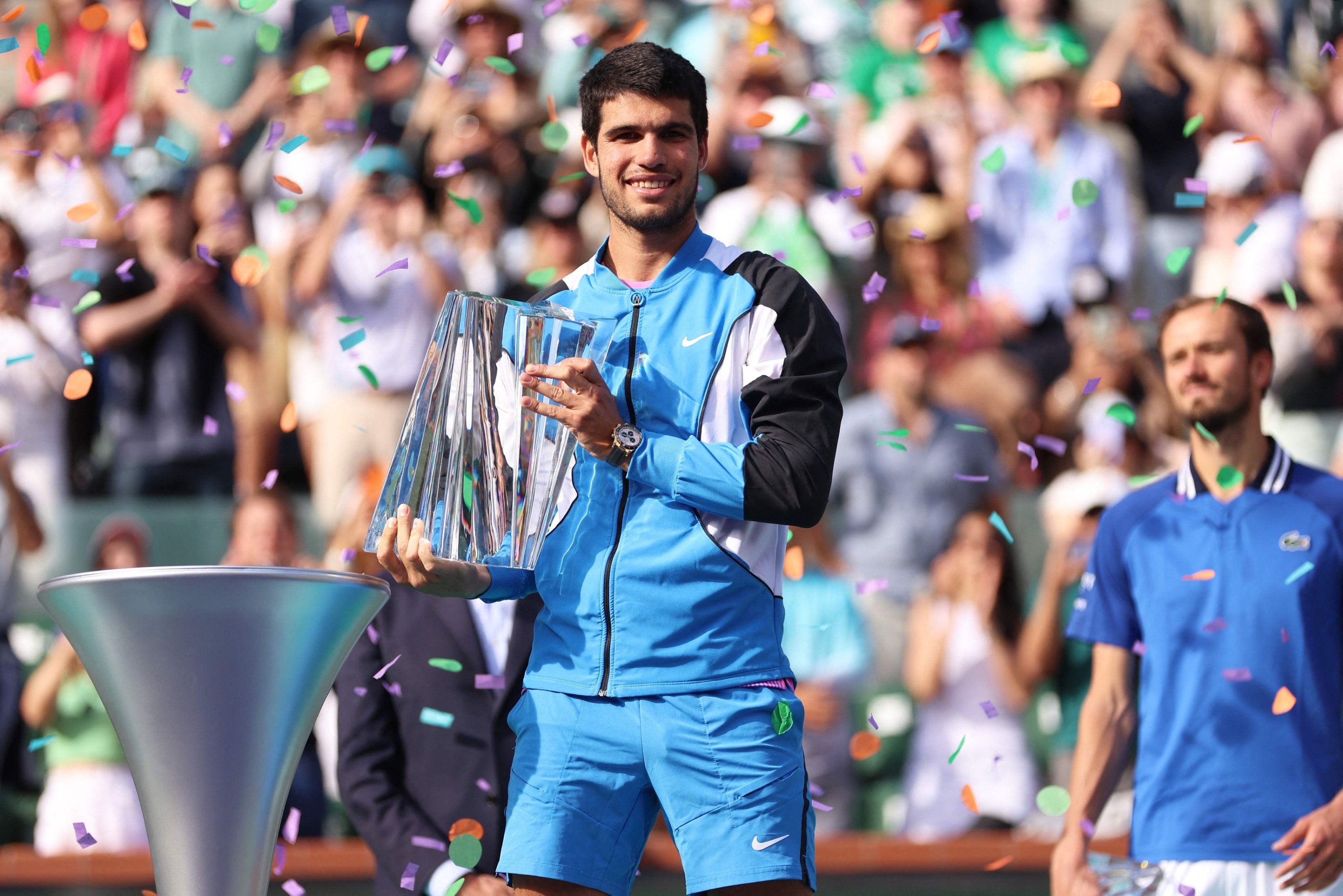 319965 Spain's Carlos Alcaraz holds his winners trophy after his straight sets victory against Daniil Medvedev in the Men's Final during the BNP Paribas Open at Indian Wells Tennis Garden, Indian Wells, U.S., March 17, 2024. (AFP Photo)