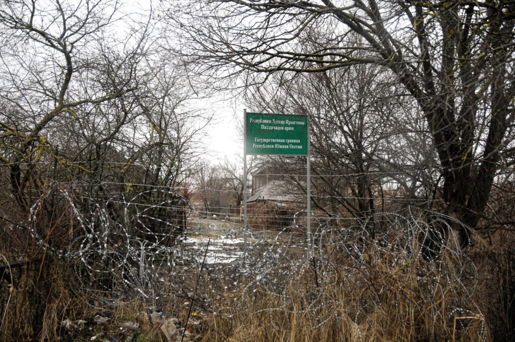 A banner is seen marking the De-Facto border to South Ossetia's border crossing is prohibited, March 3, 2023. (Reuters File Photo)